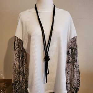 White waffle knit top.